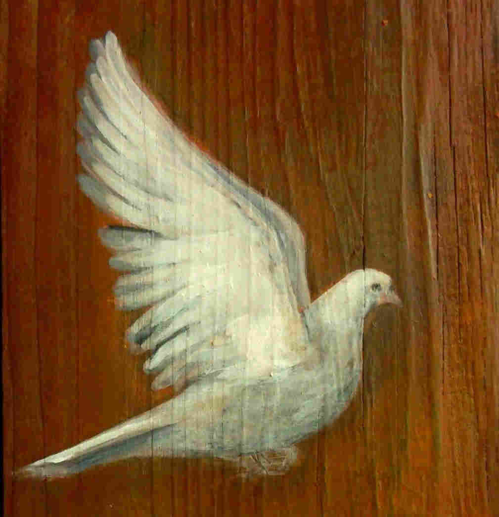 Une colombe peinte sur bois
